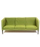 The 
three-seater 
sofa, Model AP 
18S, 
upholstered in 
green wool 
fabric and with 
dark wood legs, 
...