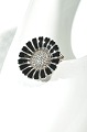 Brooch 
Marguerit 
sterling 
silver, with 
black enamel. 
Diameter 2.5 
cm. 1 inches. 
From goldsmith  
...