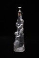 Decorative, old 
mouth-blown 
glass carafe 
with a motif of 
children 
climbing up a 
tree trunk and 
a ...