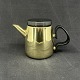 Height 12 cm.
Stamped Georg 
Jensen Design 
HK Denmark 
7012.
Small brass 
teapot with ...