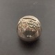 Round piggy 
bank In silver 
stain with 
lizard 
decoration on 
the top. In 
good condition, 
with gen. ...