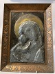 Unikt ikon af 
jomfru Maria og 
jesusbarnet, i 
ramme af 
kobber. Ikonet 
er lavet af 
bly, med glorie 
...