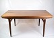 The teak dining 
table, created 
by the talented 
furniture 
designer 
Johannes 
Andersen and 
...
