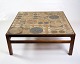 The coffee 
table, made of 
rosewood and 
ceramics, is a 
unique piece of 
furniture 
designed by Tue 
...