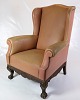This antique 
Chesterfield-
style high flap 
chair is a 
masterpiece of 
furniture art 
from the ...