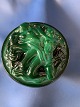 Round bowl with 
lid. Germany. 
Pressed green 
glass mass 
"malachite". 
Decorated with 
ladies. Dia.: 
...