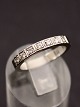 14 carat white 
gold ring size 
56 with 7 
brilliant cut 
diamonds a' 
approx. 0.1 ct. 
Item No. 577943