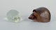 Paul Hoff for 
Kosta Boda and 
an unknown 
Swedish glass 
artist.
Two hedgehogs 
in art glass. 
One ...