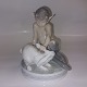 Porcelain 
figurine of pan 
/ faun with 
rabbit. 
Designed by 
Christian 
Thomsen. Model 
number 439. ...