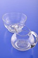 Sugar creamer 
set of clear 
glass, from 
Danish 
glassworks. 
Sugar bowl on 
foot, diameter 
10.2 ...