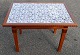 Danish mahogany 
tile table, 
20th century. 
With 24 
manganese-
coloured tiles 
from the second 
half ...