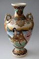 Satsuma vase, 
Japan, ca.1900. 
Polycrom 
decoration and 
gilded with 
women in 
kimonos. H: 26 
cm. ...