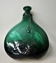 Persian bottle, 
18th century. 
Dark green 
glass with 
applied thread 
around the neck 
and strong ...