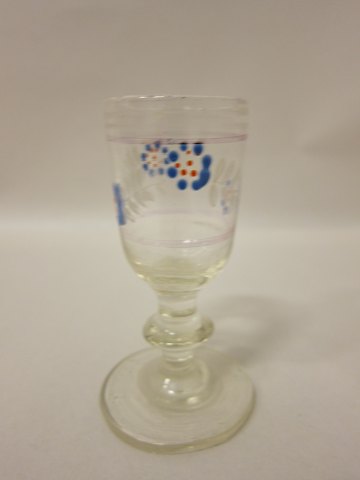 Liqueur glass
Antique, enamel coloured decoration
About 1880
Please note: 2 small chips unter the foot and wear by the glass