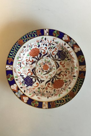 Derby Faience Deep plate/plate decorated with flowers in red, blue, green and 
gold