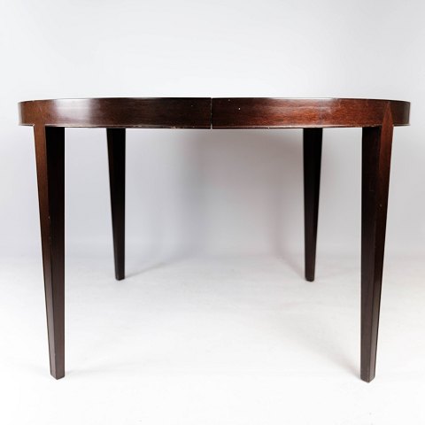 Spisebord i mahogni med tre udtræksplader, af dansk design fremstillet af Haslev 
Møbelfabrik i 1960erne.
5000m2 udstilling.
