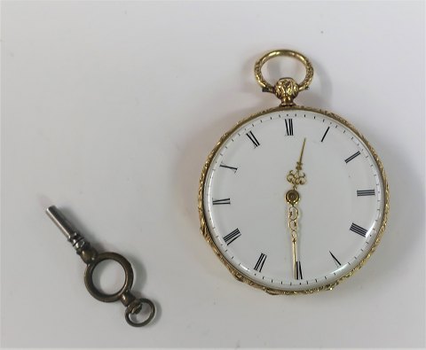 Taschenuhr aus 18 Karat Gold. Durchmesser 41mm. Schlüssel enthalten. Die Uhr 
funktioniert. Produziert ca. 1850