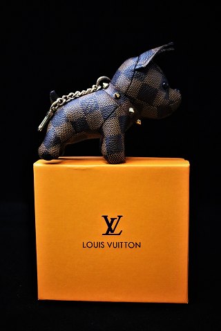 Original Louis Vuitton accessories, bag pendant / key ring in the shape of a 
small dog with Damier Ebéne Canvas. (In original box)...