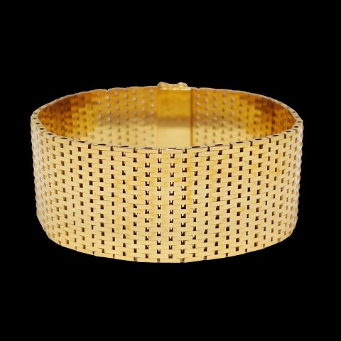 A bracelet in 14k gold, w. 24 mm