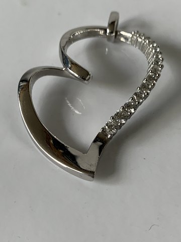 Hjerte vedhæng i Sølv med sten
Stemplet 925S JAa
Længde med øsken. 5,8 cm