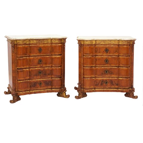 Pair of Danish mid 18th century baroque walnut 
veneered and partly gilt chest of drawers by 
Mathias Ortmann, Copenhagen, circa 1750. H: 78cm. 
Marble top: 76x45cm