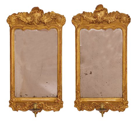 Pair of Northgerman gilt Rococo mirrors circa 
1760. H: 65cm. W: 35cm