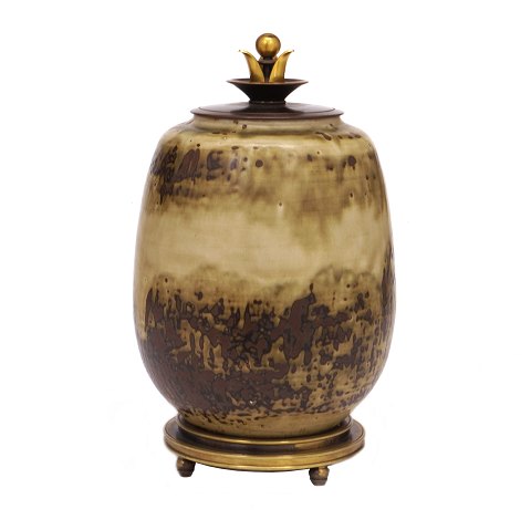 A Danish stoneware lidded jar by Carl Halier, 
1873-1948, for Royal Copenhagen. Signed 1944. H: 
26cm