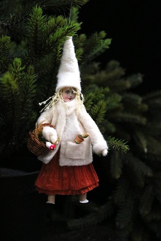 Christmas tree decoration in the form of a handmade Christmas girl made of paper 
and felt...