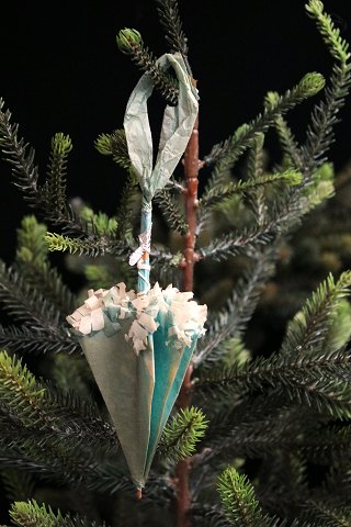 Antique Christmas tree ornament from 1900 in the shape of an umbrella made of 
tissue paper...