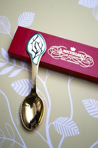 A. Michelsen Christmas spoon from 1997 in gold-plated sterling silver. Designed 
by Maja Lisa Engelhardt.