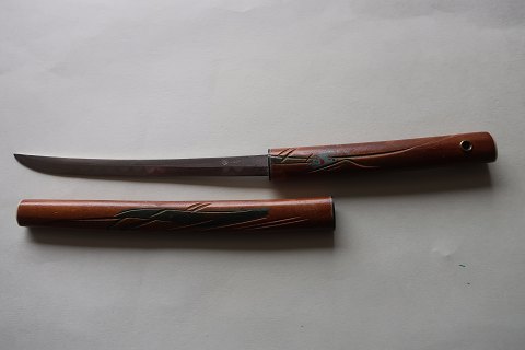 An old paper knife/paper cutter with a handle made of woodThe paper knife is good working withL: 21cmIn a good condition