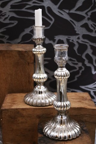 A pair of 19th century candlesticks in poor man