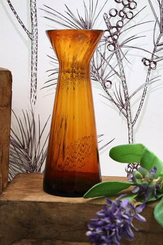Antique amber colored hyacinth glass in mouth-blown glass from Holmegaard 
glassworks. Antique amber colored hyacinth glass in mouth-blown glass from Holmegaard 
glassworks.