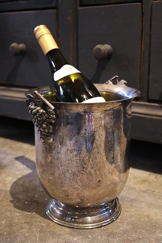 Old French wine / champagne cooler in silver-plated metal 
with bunches of grapes on the side...