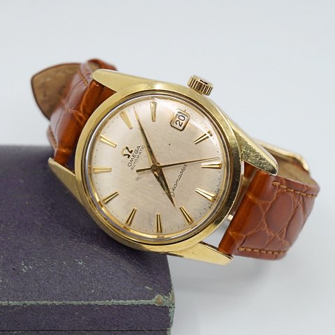 Omega; Seamaster  armbåndsur i stål med guld, årgang 1963