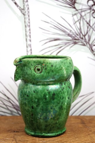 Old "Lillerrød" owl jug in glazed earthenware in fine green glaze with fine patina...