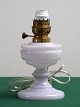 White opaline 
kerosene lamp. 
Later changed 
to electricity. 
Height 30 cm