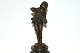 Boy with 
accordion made 
of patinated 
bronze
Mounted on a 
round pedestal 
of variegated 
black ...