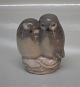 Royal 
Copenhagen bird 
834 RC Owls - 
pair Th. Madsen 
1907 9 x 7 cm 
New # 1020077  
In mint and ...