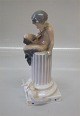 Royal 
Copenhagen 0456 
RC Faun on 
column with 
squirrel Chr. 
Thomsen 1903 23 
cm In mint and 
nice ...