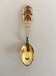 Anton Michelsen 
Christmas fork 
1928, Gilded 
sterling silver 
with enamel.
Ceramicist 
Thorkild ...