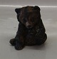 Royal 
Copenhagen 
Aluminia 
Faience 
figurine 3745 
Bear cub, 
sitting JG 
1974. 
Design Jeanne 
Grut