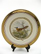 Royal 
Copenhagen 
plate dec. with 
bird D. 27,5 
cm.