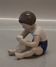 Bing and 
Grondahl B&G 
2388 Girl with 
bricks Claire 
Weiss 9 cm 
Marked with the 
three Royal 
Towers ...