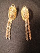 Earing
 Tri-color 
gold 14k Gold
 top width: 
1.5 cm Length: 
2 cm.
 total length 
of chain: 4.5 
...
