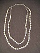 Double The 
Council 
necklace.
 Freshwater 
pearls
 inside reste 
rad length is 
57 cm
