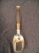 Lotus.
 Silver spoon.
 Length 17.52 
cm