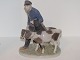 Large Royal 
Copenhagen 
figurine, Boy 
with two 
calves.
The factory 
mark shows, 
that this was 
...