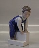 Bing and 
Grondahl Boy 
B&G 2399 "I am 
coming now" 
Claire Weiss 11 
cm Marked with 
the three Royal 
...