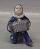 Royal 
Copenhagen 3667 
RC Child with 
Accordion Ada 
Bonfils 11 cm 
In mint and 
nice condition
The ...